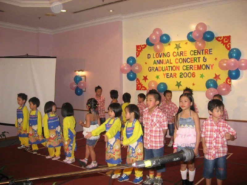 Children performing at D Loving Care Centre's first annual concert and graduation ceremony in 2006