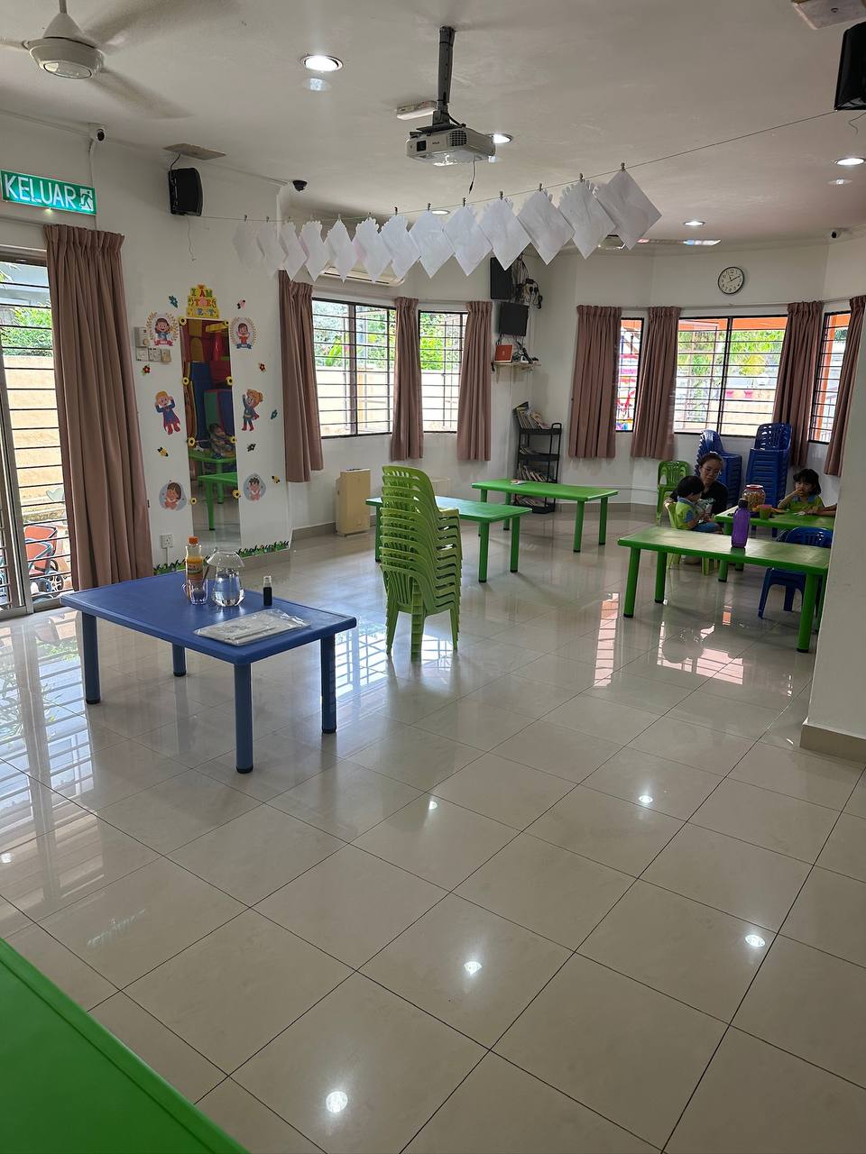 The bright main activity room at D Loving