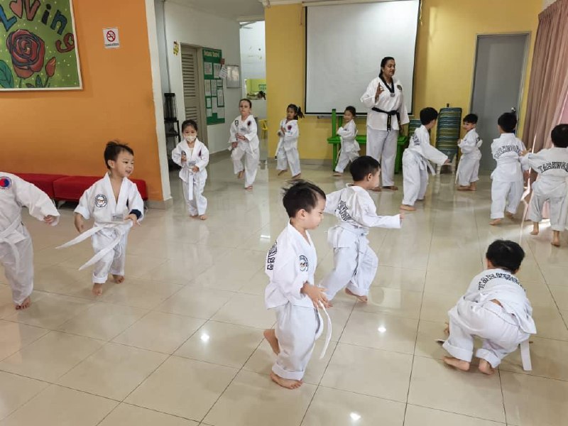 Children taking part in a supervised taekwondo activity